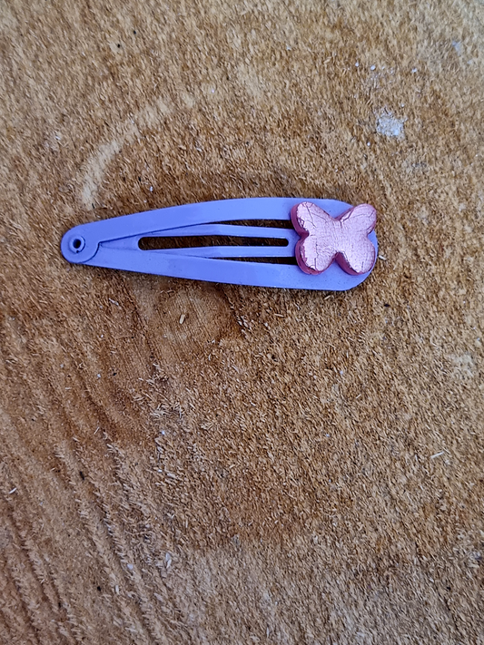 Purple Hairclip featuring a Pink Sparkling Butterfly