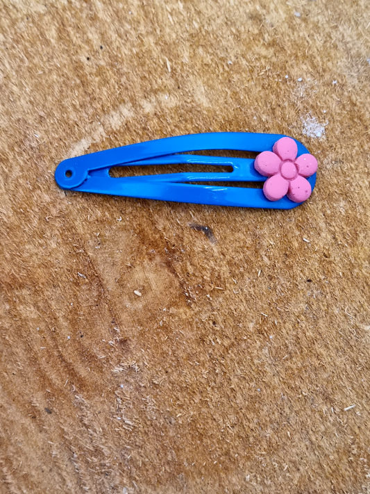 Blue Hairclip featuring a Pink Sparkling Flower